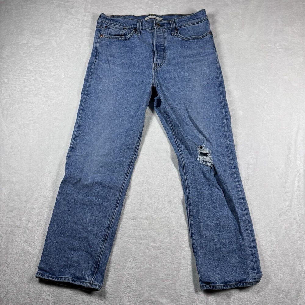 Levi's Straight Leg Jeans in Medium Blue with Distressed Knee